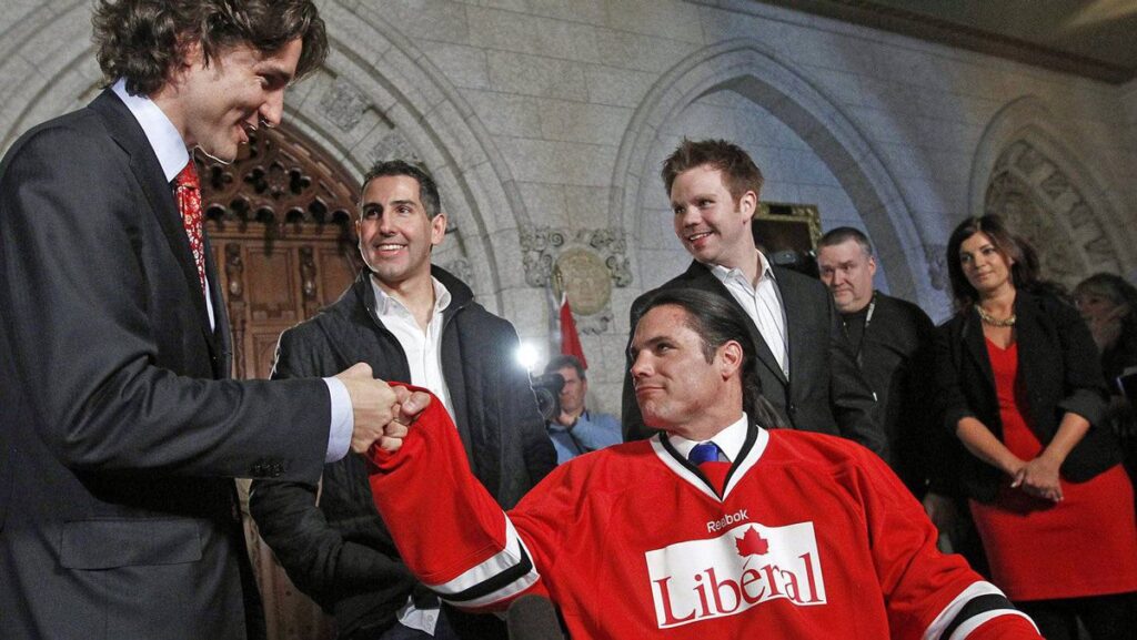 Patrick Brazeau gets a haircut from Justin Trudeau